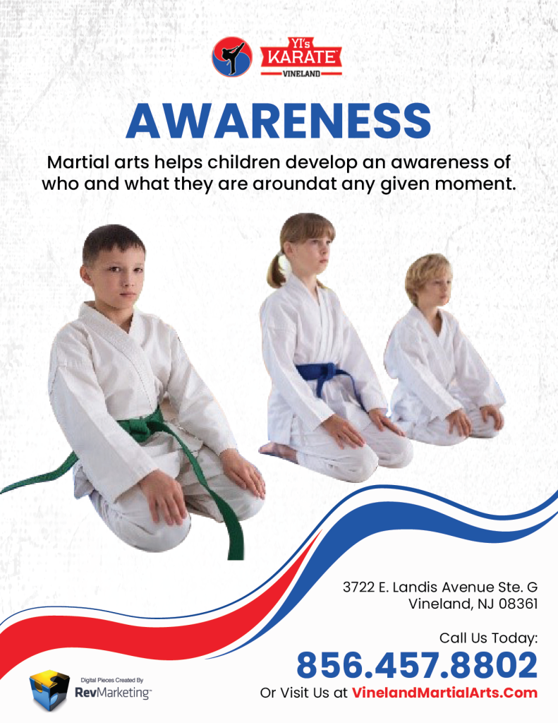 Three Martial Arts Student Kneeling
